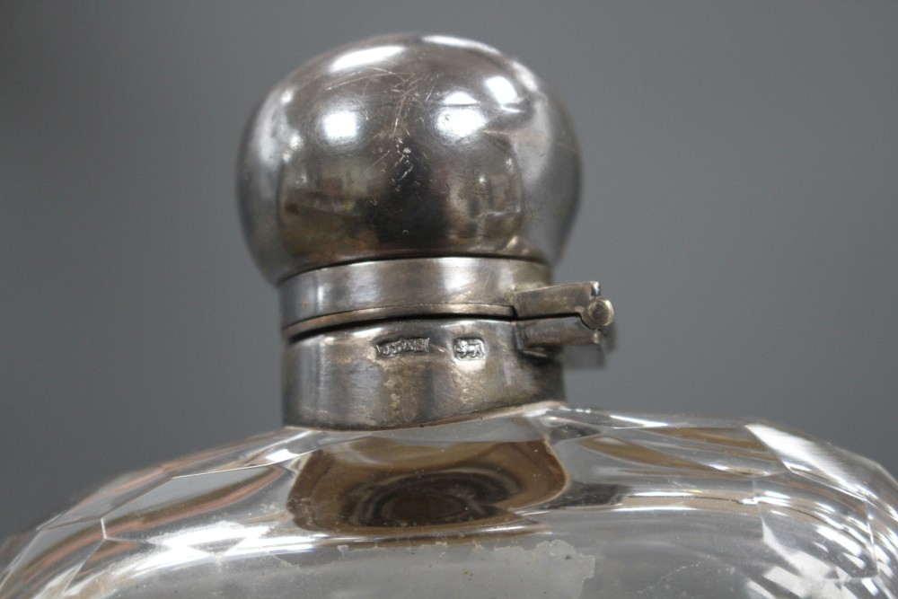 A Victorian silver mounted cut glass hip flask by James Dixon & Sons, Sheffield, 1891, 15.4cm.
